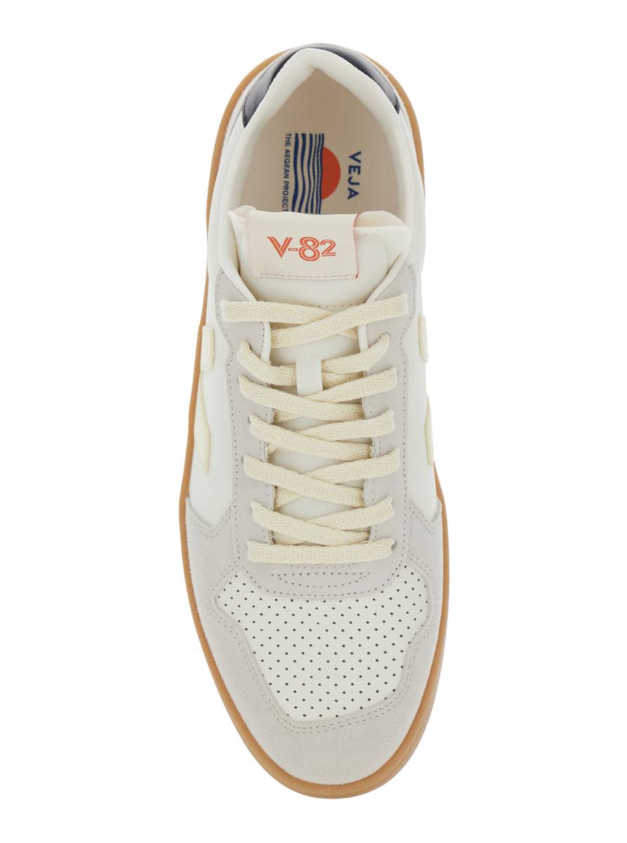 'V-82' Grey Low Top Sneakers With Logo Patch On Tongue And Side And Logo Letteirng On The Heel In Leather Unisex