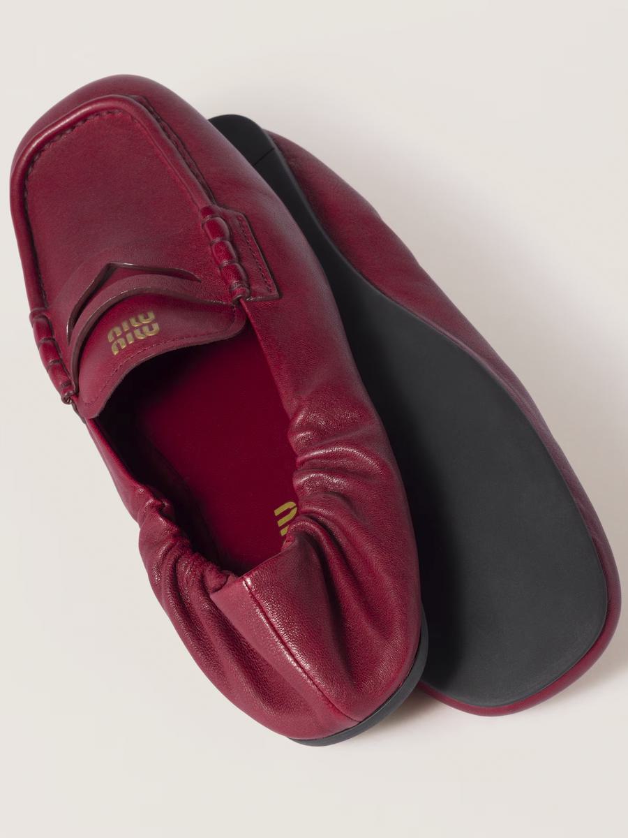 Miu Miu Embossed-Logo Loafers