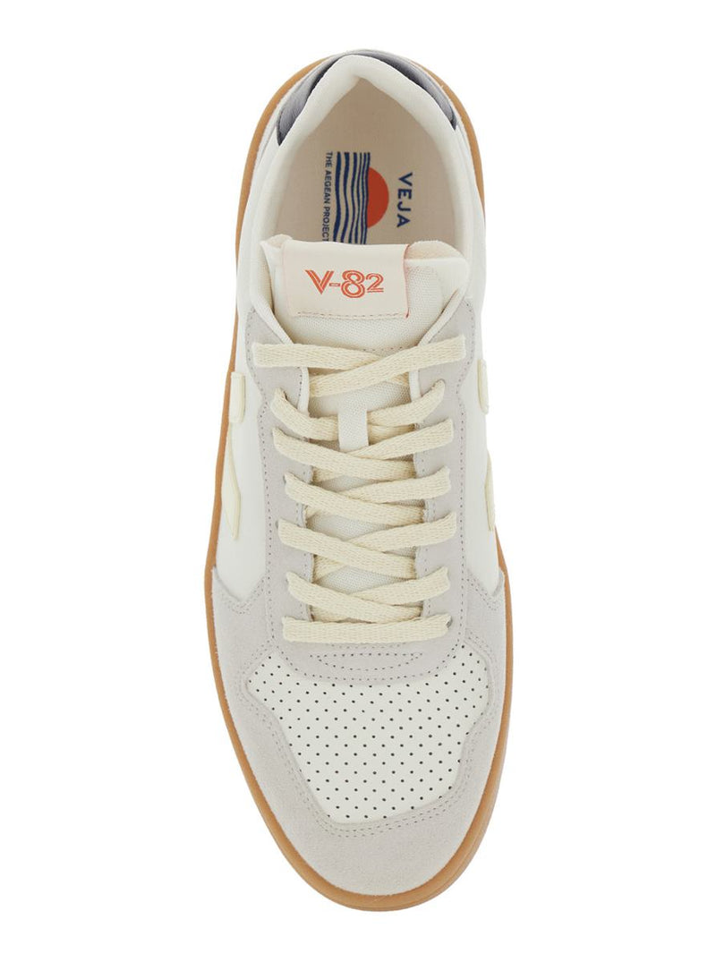 'V-82' Grey Low Top Sneakers With Logo Patch On Tongue And Side And Logo Letteirng On The Heel In Leather Unisex