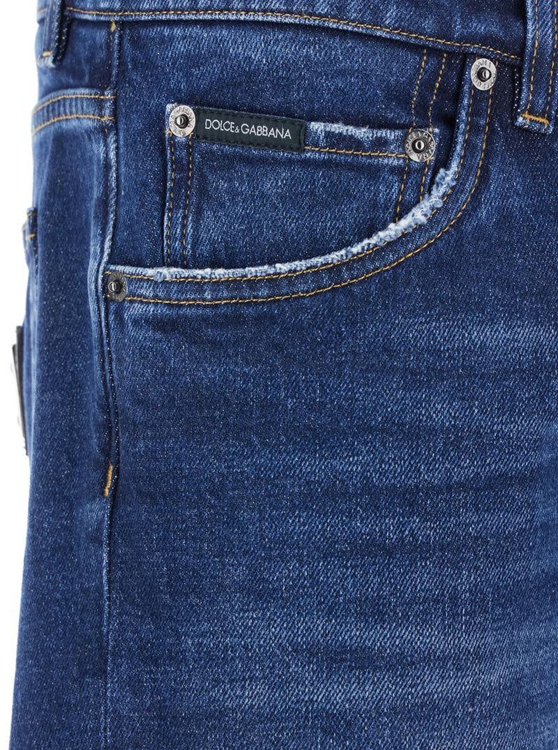 Blue Slim Jeans With Logo Patch On The Rear In Denim Man