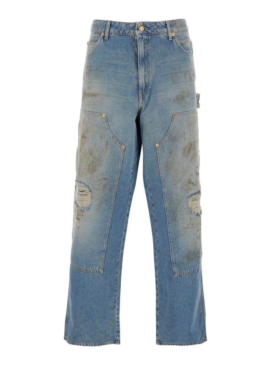 Light Blue Jeans With Ripped Details And Distressed Effect In Denim Man