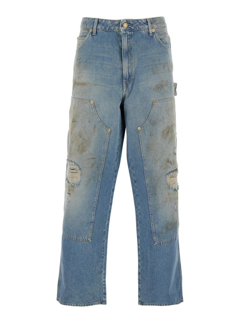 Light Blue Jeans With Ripped Details And Distressed Effect In Denim Man