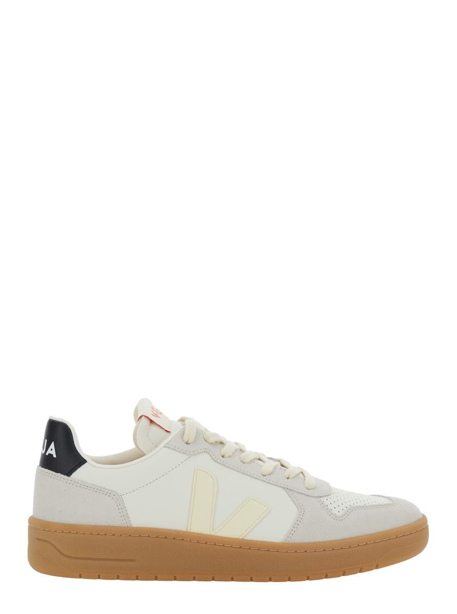 'V-82' Grey Low Top Sneakers With Logo Patch On Tongue And Side And Logo Letteirng On The Heel In Leather Unisex