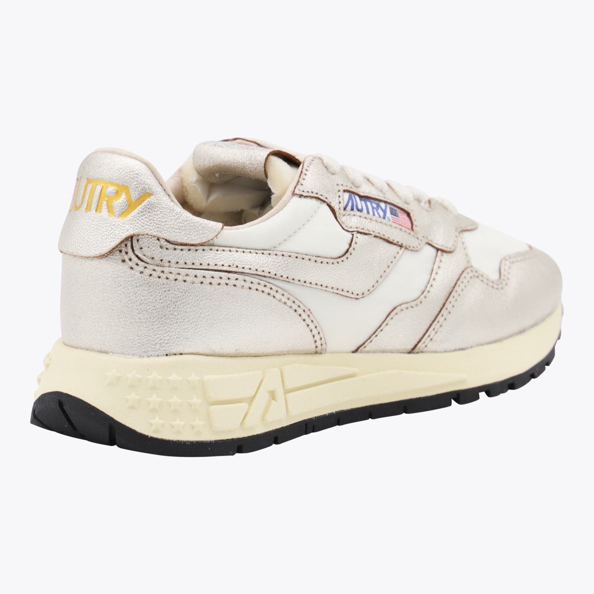 Autry White And Gold Leather Reelwind Sneakers