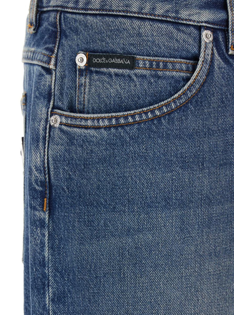 Blue Jeans With Belt Loops And Logo Patch On The Rear In Denim Man