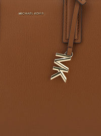 Brown Handbag With Metallic Lettering Logo And Pendant On The Front In Leather Woman