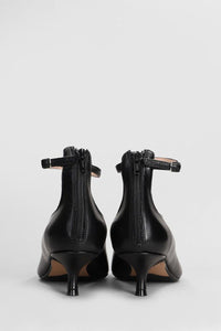 Anna F. Pumps
