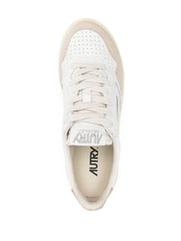 Autry Medalist Low Sneakers In White And Gold Leather Shoes