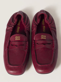 Miu Miu Embossed-Logo Loafers