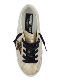 'Superstar' White Low Top Sneakers With Glittered Star Patch And Laminated Heel With Logo Lettering In Leather Woman