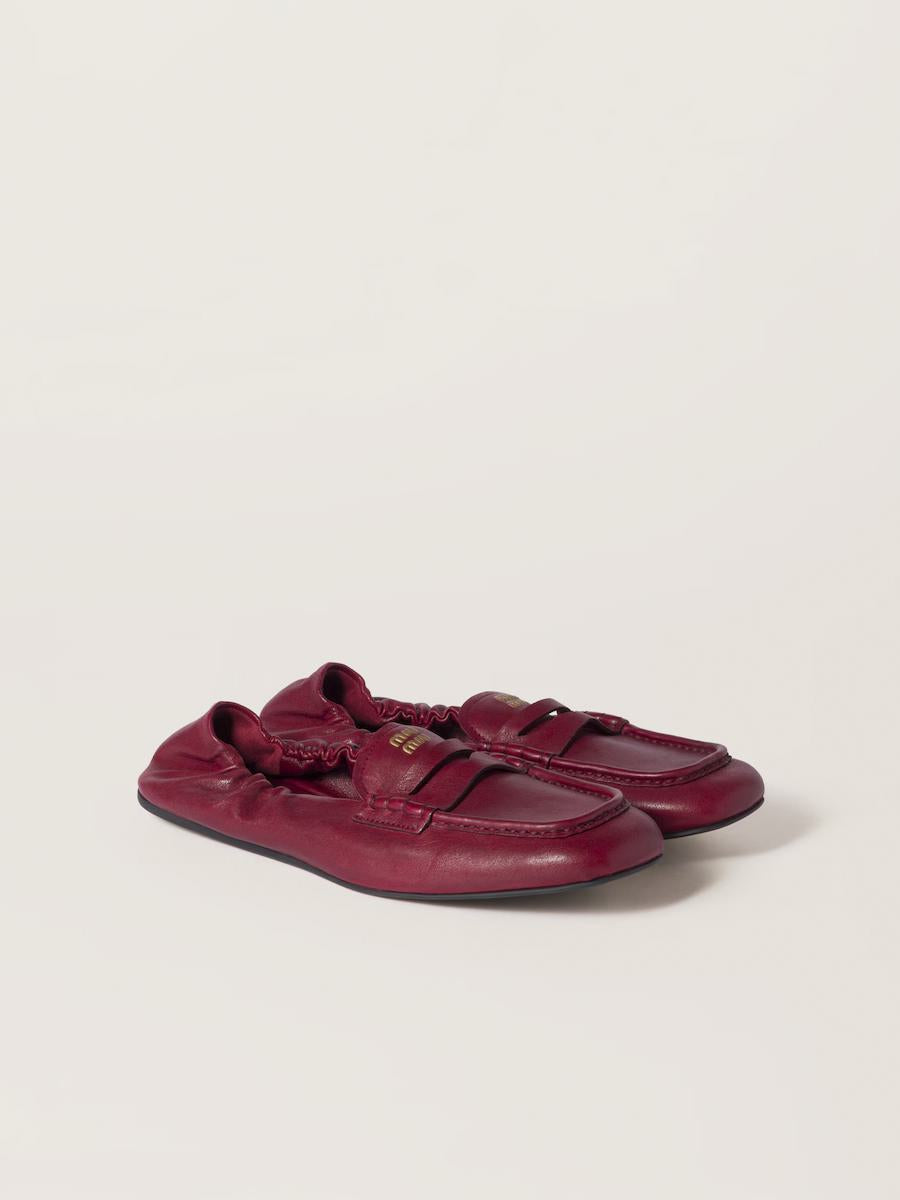 Miu Miu Embossed-Logo Loafers