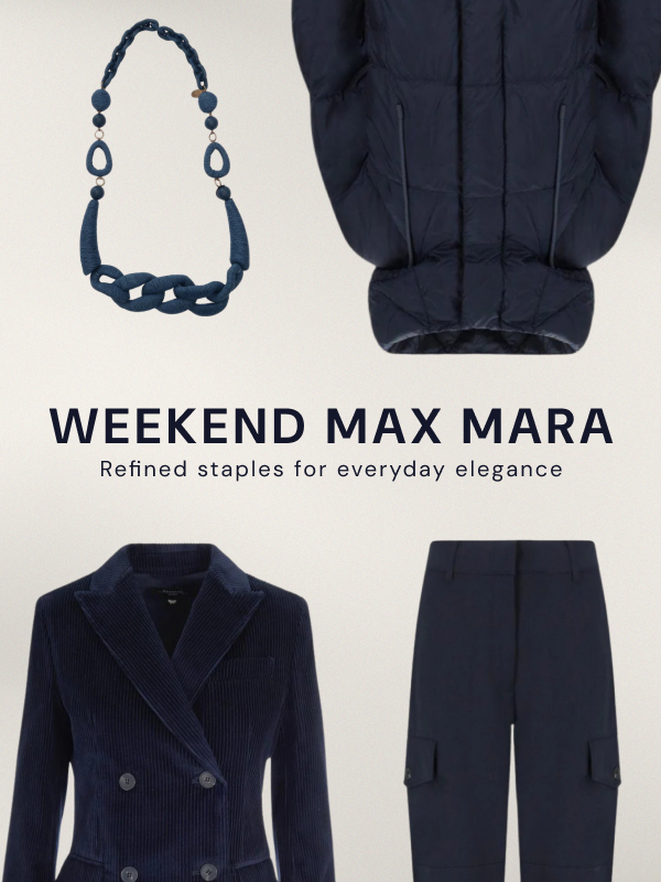 "Weekend Max Mara" collection displaying four navy pieces: sculptural chain necklace, puffer jacket, double-breasted blazer, and cargo pants. Tagline: "Refined staples for everyday elegance."