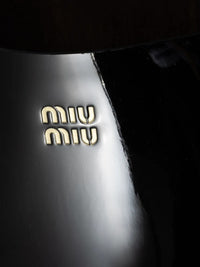 Miu Miu Patent Leather Clogs