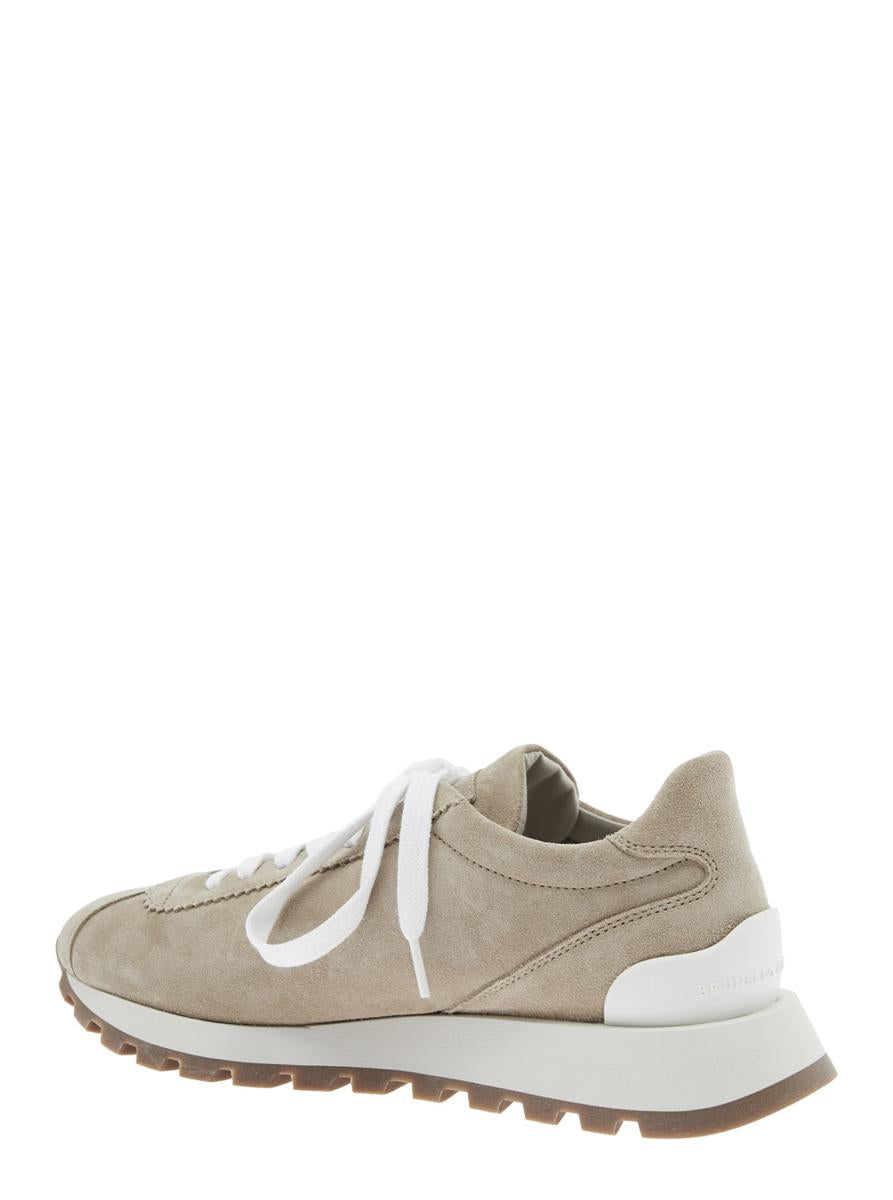 Beige Low Top Sneakers With Monil Detail On The Side And Embossed Logo Lettering On The Rear In Leather Woman