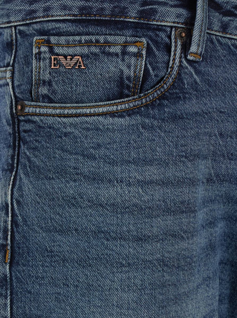Blue Jeans With Belt Loops And Logo Patch On The Rear In Denim Man