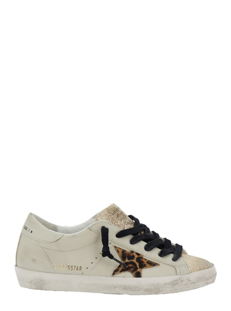 'Superstar' White Low Top Sneakers With Glittered Star Patch And Laminated Heel With Logo Lettering In Leather Woman