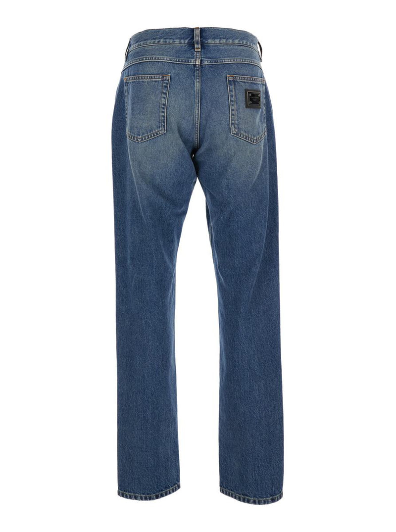 Blue Jeans With Belt Loops And Logo Patch On The Rear In Denim Man