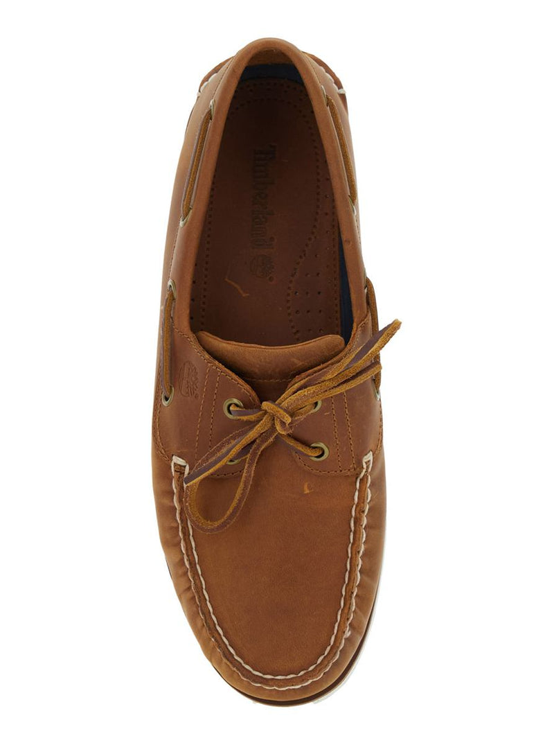Brown Loafers With Bow Detail On The Front And Embossed Logo On The Side In Leather Man