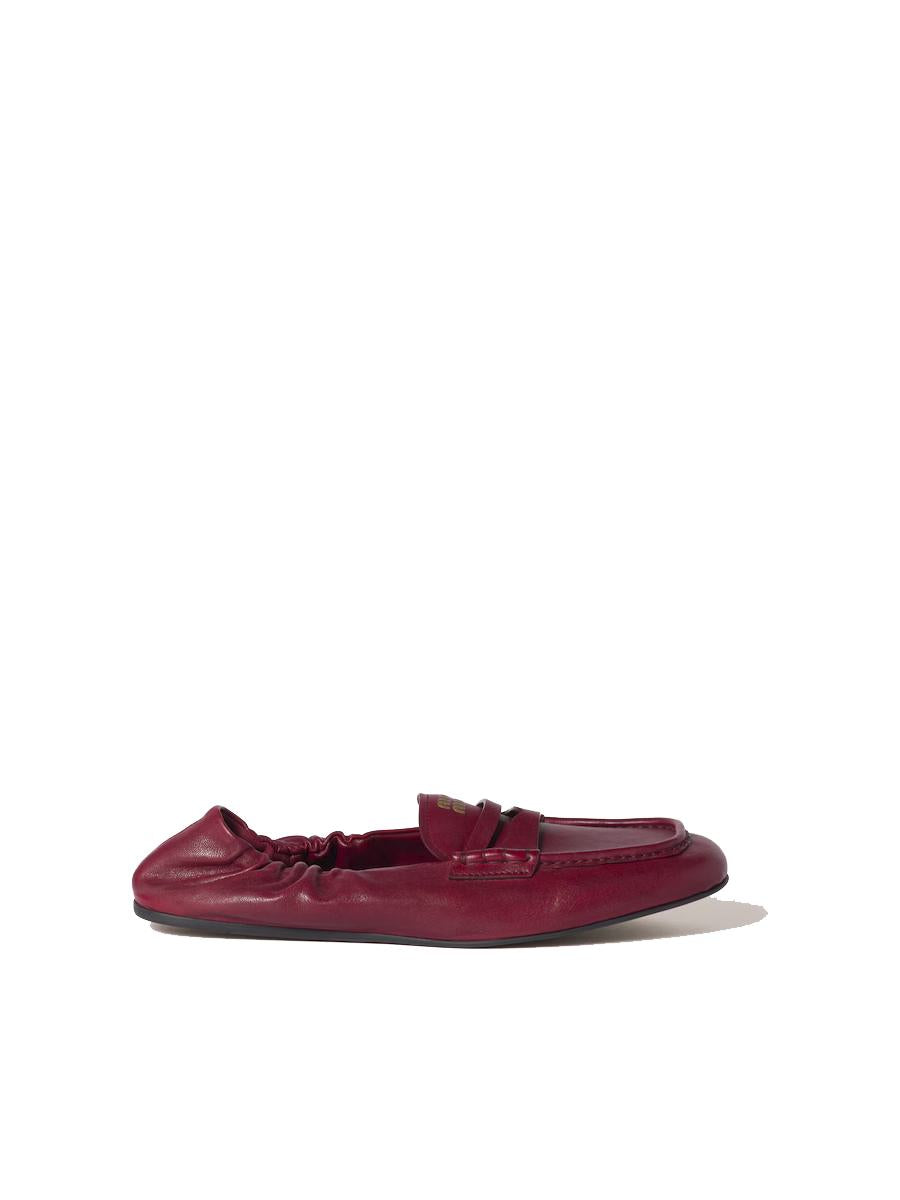 Miu Miu Embossed-Logo Loafers
