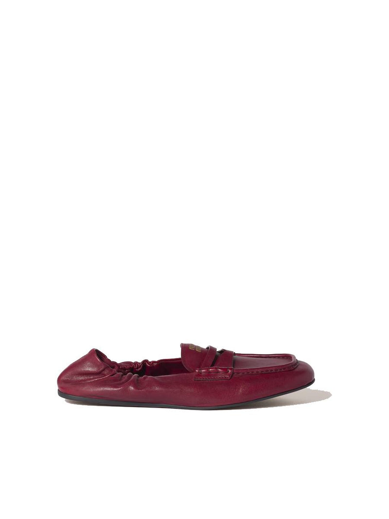 Miu Miu Embossed-Logo Loafers