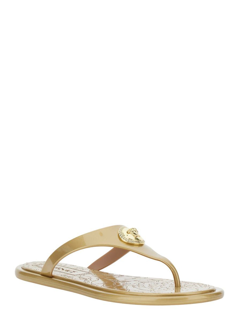 Beige Thong Slided With Medusa Plaque On The Front And Laminated Design In Tech Fabric Woman