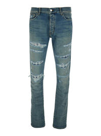Blue 'Ma Quand' Jeans With Ripped Details On The Front And Logo Patch On The Rear In Denim Man
